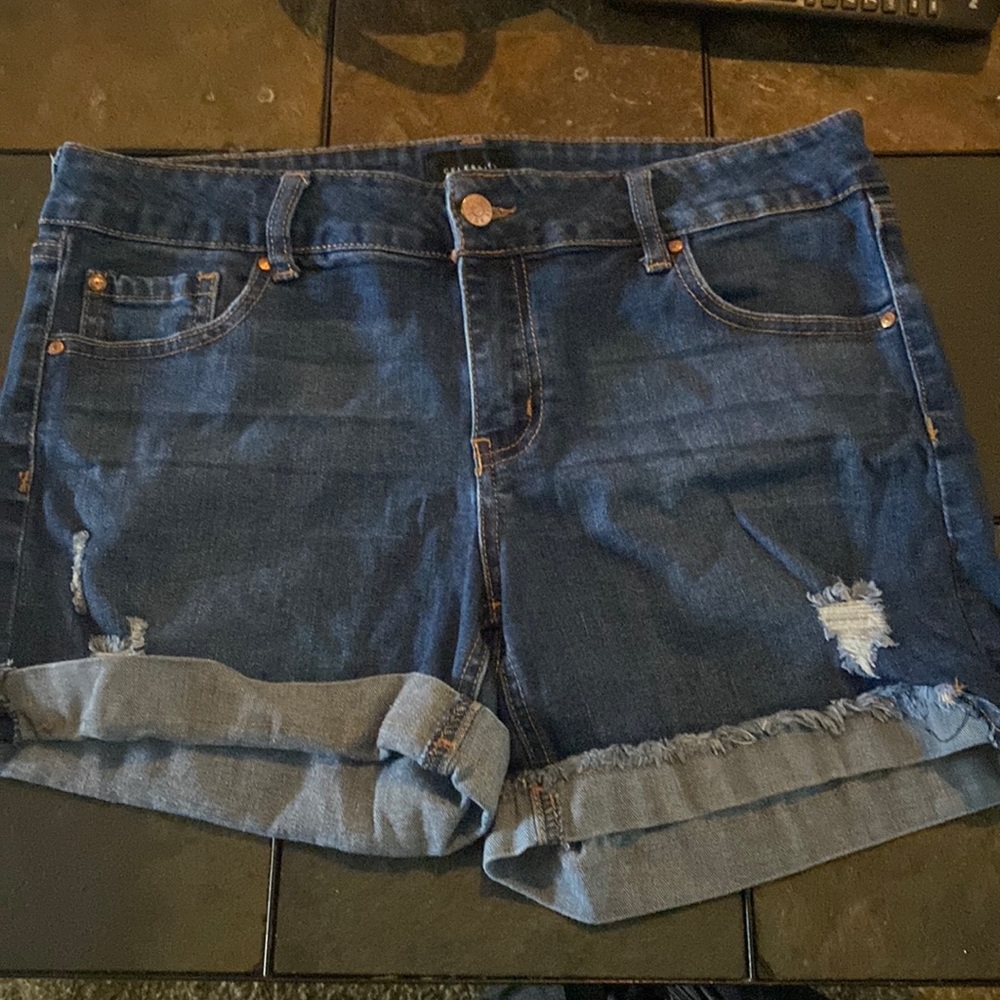 Blue distressed Jean shorts in a size 11.